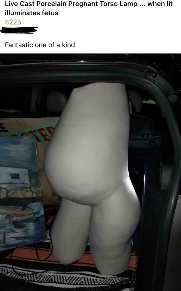 Porcelain pregnant torso lamp for sale in a car trunk, part of creepy things sell online.