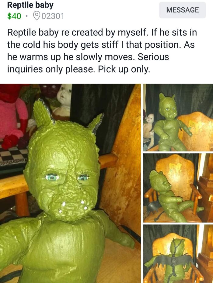 Creepy green reptile baby doll with horns and wings seated on a wooden chair for sale online.