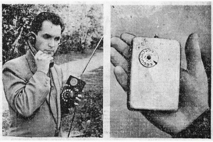 Man using an early portable phone, showing historical invention ahead of its time.