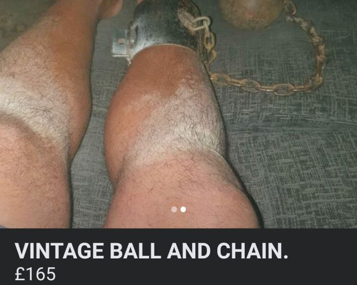 Legs with a chain and vintage ball attached, listed for sale.