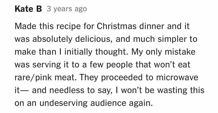 Text comment about a cooking mistake involving serving rare meat to guests who microwaved it, highlighting recipe experience.