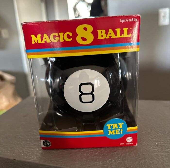 Magic 8 Ball in packaging on a counter, capturing the essence of Retro Fever nostalgia.