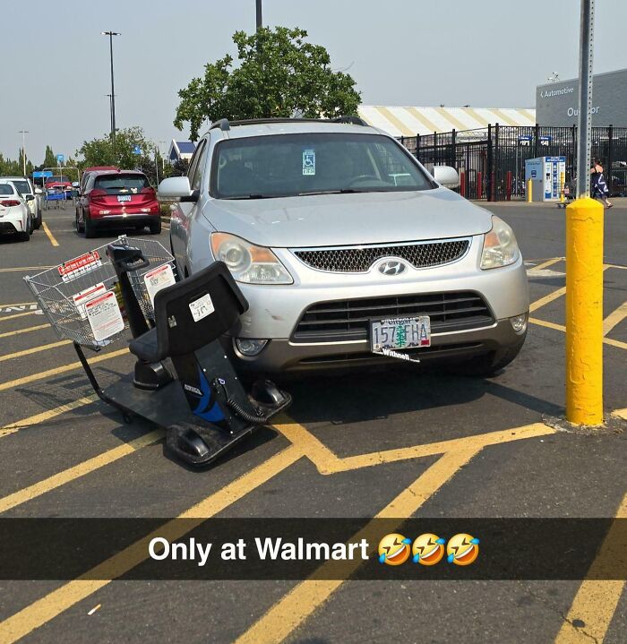 Car parked in access aisle at Walmart, blocking mobility scooter, showcasing people being complete jerks.