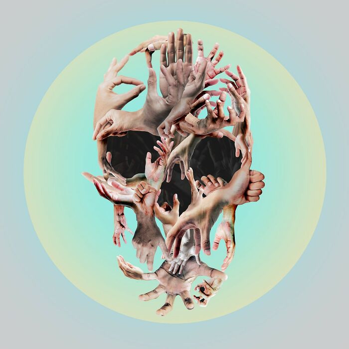 Skull artwork created with digital and traditional collage of human hands, forming a unique and artistic design.