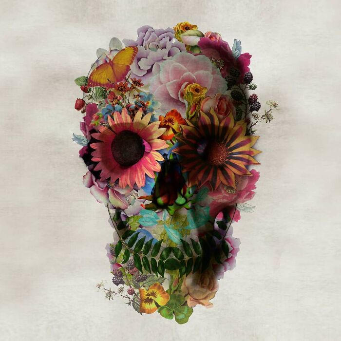 Skull artwork using digital collage with flowers and butterflies in vibrant colors.