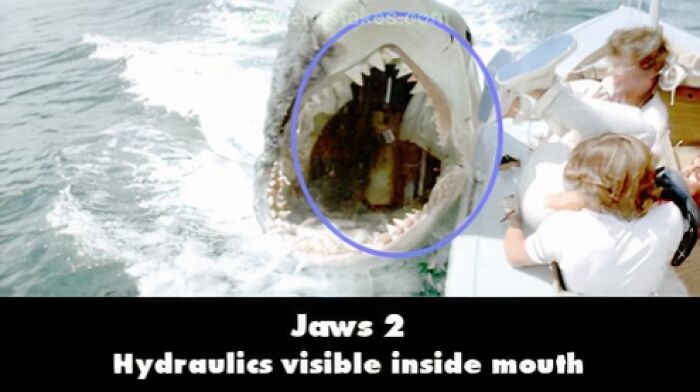 Shark animatronic with visible hydraulics in Jaws 2, showcasing a funny movie mistake.