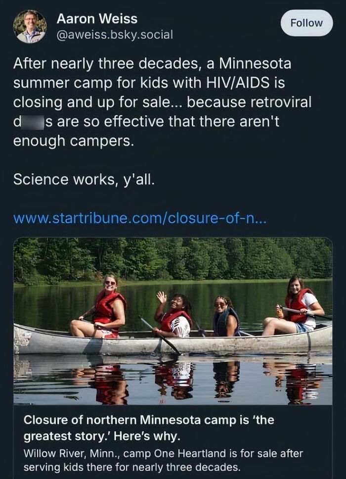 People in a canoe on a serene lake, highlighting heartwarming kindness and the impact of effective HIV/AIDS treatments.