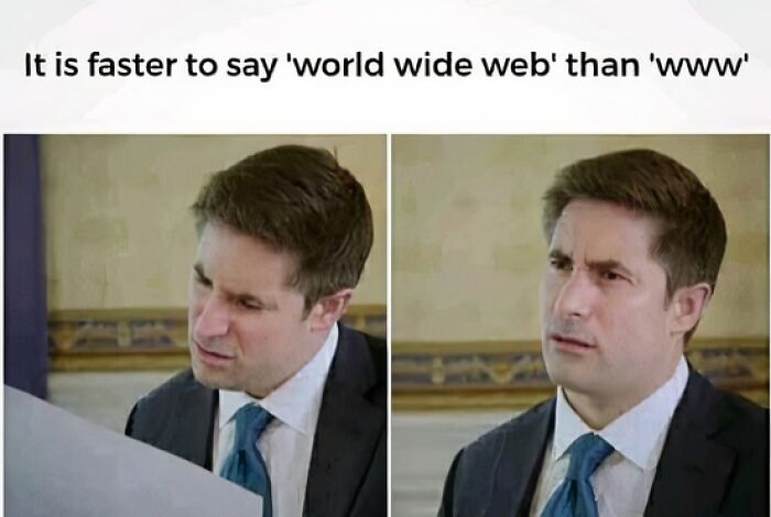 A man in a suit reacting humorously to the statement about 'world wide web' being faster to say than 'www'. Linguistic memes.