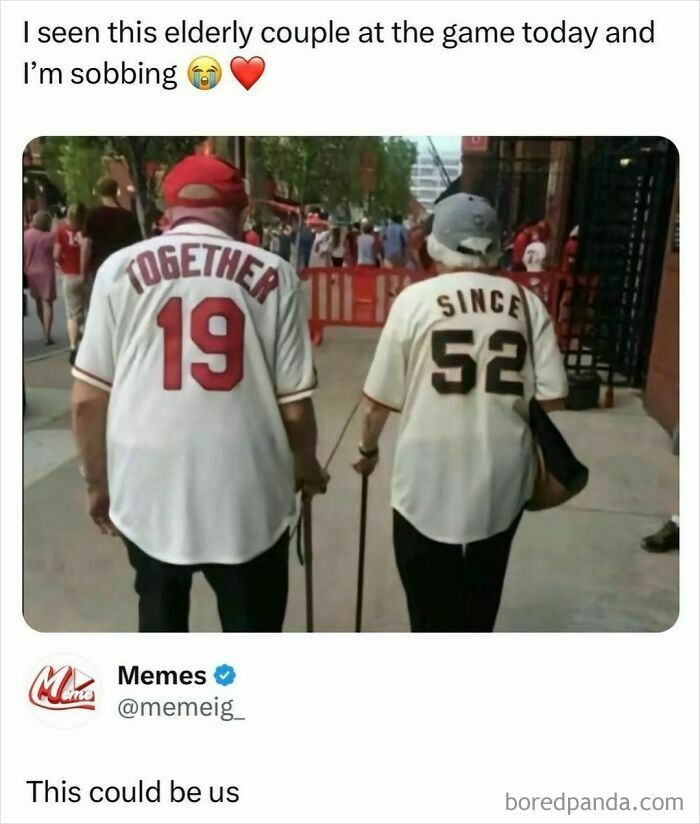 Elderly couple at game wearing matching jerseys, one says "TOGETHER 19" and the other "SINCE 52," shared on meme page.