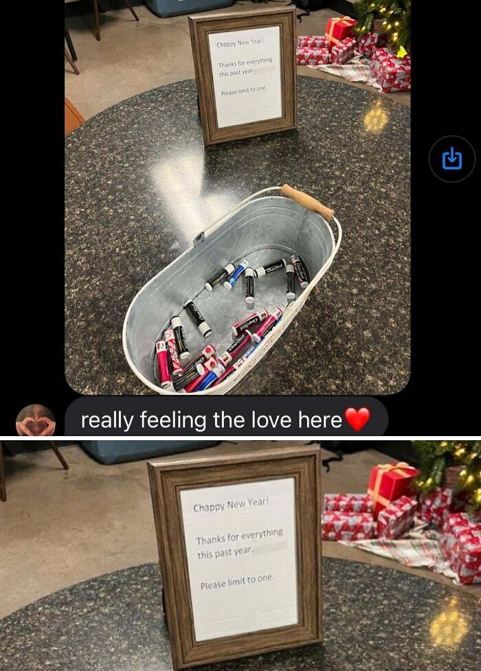 Company gifts and bonuses displayed as batteries in a basket with a sign reading "Please limit to one."