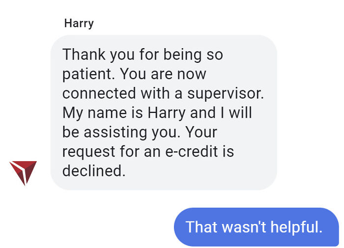 Chat support response declining e-credit request, customer replies with dissatisfaction.