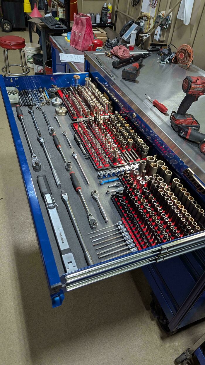 Neatly organized drawer of tools and sockets, showcasing next-level organization in a workshop setting.