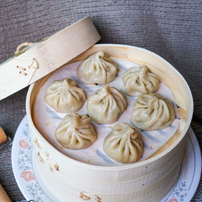 Dim sum dumplings in a bamboo steamer, a delightful Valentine's Day find.