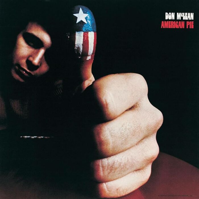 '70s song cover featuring a hand with an American flag painted on the thumb, capturing the essence of iconic music.