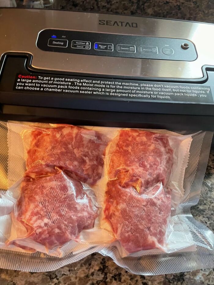 Vacuum sealer sealing meat, showcasing one of the best gadgets for 2025.