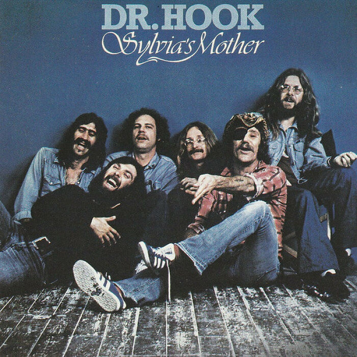 Album cover of Dr. Hook's 'Sylvia's Mother,' featuring the band members in casual attire, representing '70s music hits.