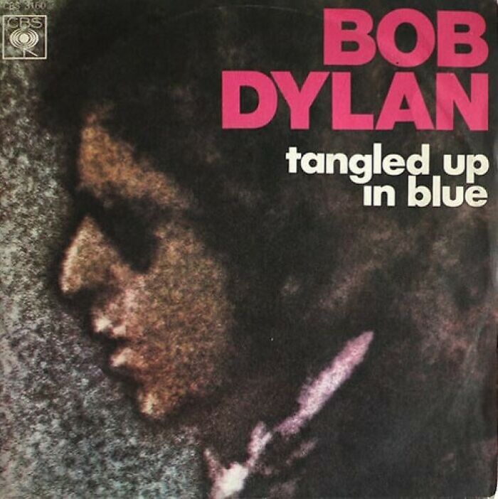 Cover of "Tangled Up in Blue" by Bob Dylan, iconic '70s music with a vintage style.