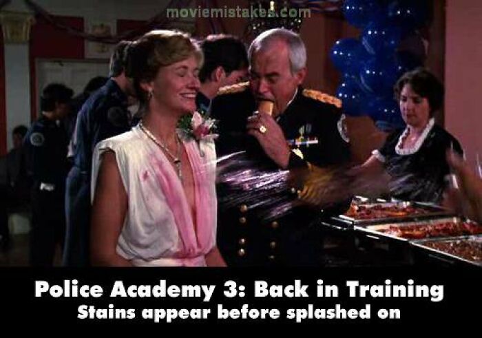 Funny movie mistake in "Police Academy 3" where stains appear on a woman's dress before being splashed.