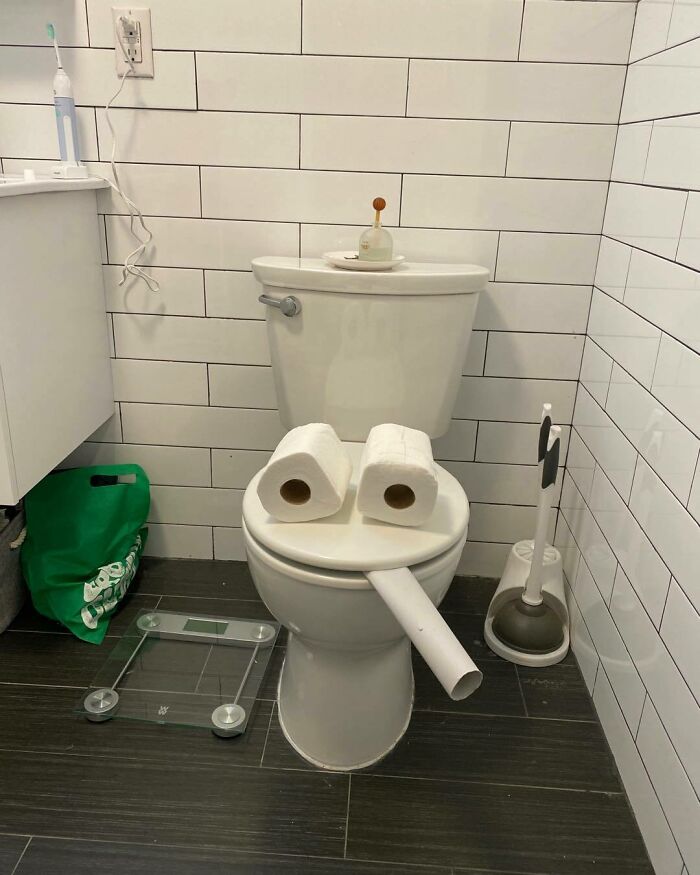 Toilet humor setup resembling a face, featured in a Hilarious-Kids theme.