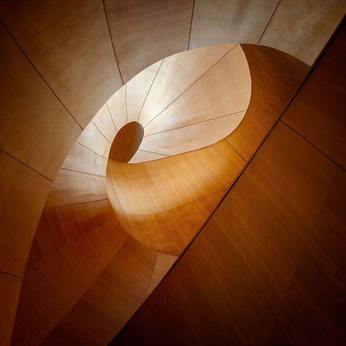 Abstract wooden spiral structure, showcasing winning photography at the 2024 Budapest International Foto Awards.