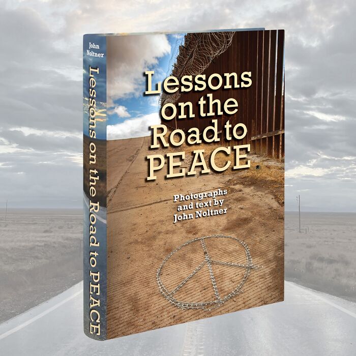 Book cover for "Lessons on the Road to Peace" featuring a peace sign on a rural road, with a cloudy sky backdrop.