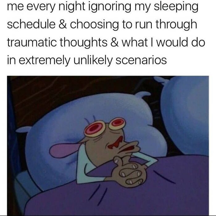 Cartoon character awake in bed, eyes wide open, illustrating an introvert's overthinking at night.