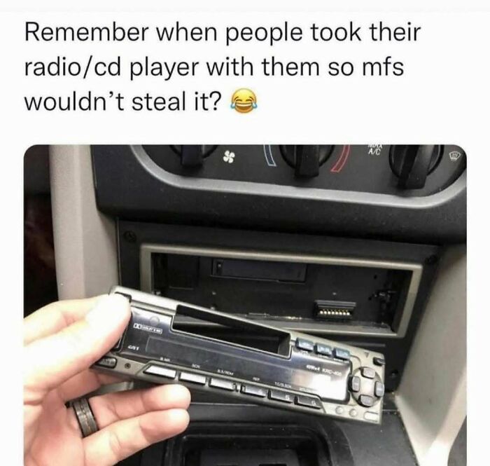 Hand removing car radio CD player, nostalgic meme humor about theft prevention.