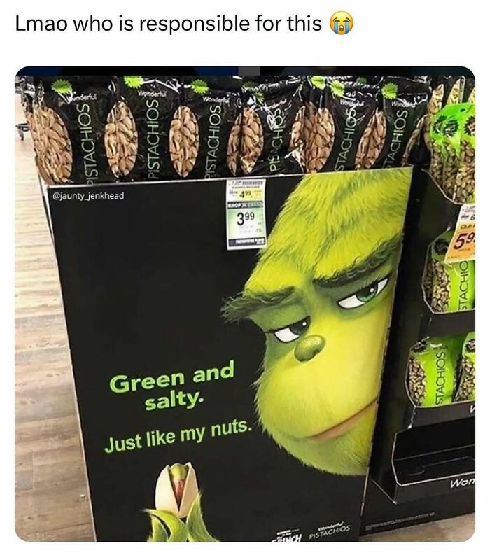 Display of pistachios with a humorous Grinch-themed sign; hilarious random meme content.