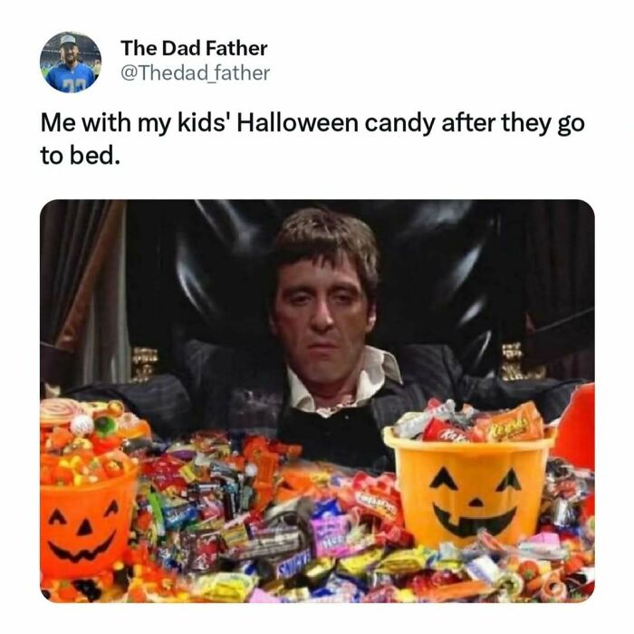 Dad enjoying Halloween candy alone while kids sleep, surrounded by colorful treat-filled pumpkin buckets.