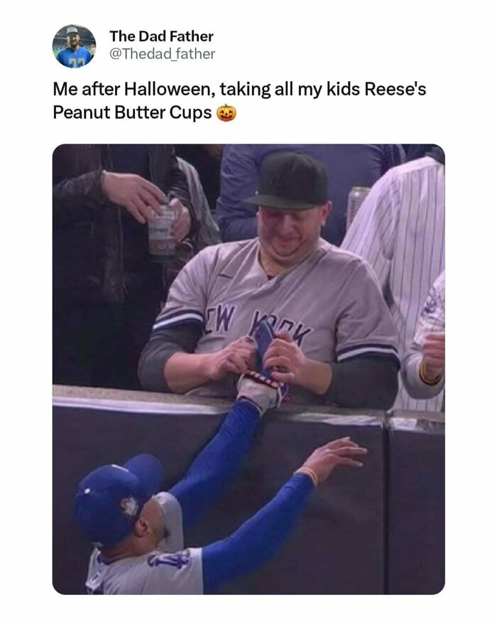 A dad wearing a baseball jersey humorously pulls back a glove from a player, relating to the daily joys and struggles of fatherhood.