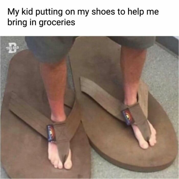 Child humorously wearing oversized flip-flops, embodying dad's daily joys and struggles.