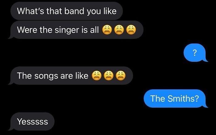 Text message exchange about a British band, The Smiths, with emoticons expressing confusion and understanding.