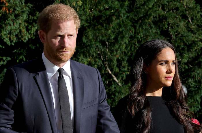 Couple walking outdoors in formal attire, related to alleged behavior and therapy news.