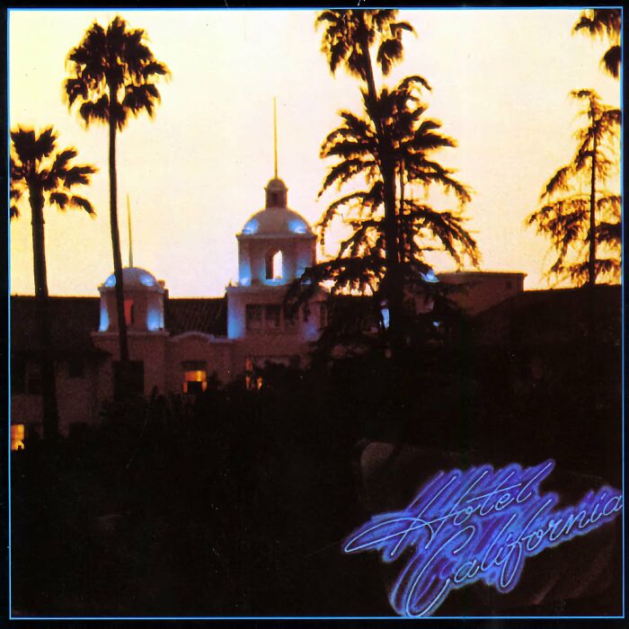 Album cover of Hotel California with palm trees silhouetted against a sunset.