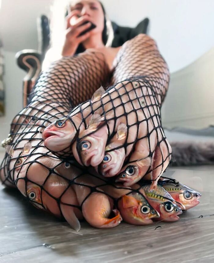 Turkish artist creates unexpected collage of fish in netted stockings on feet, emphasizing surreal art.