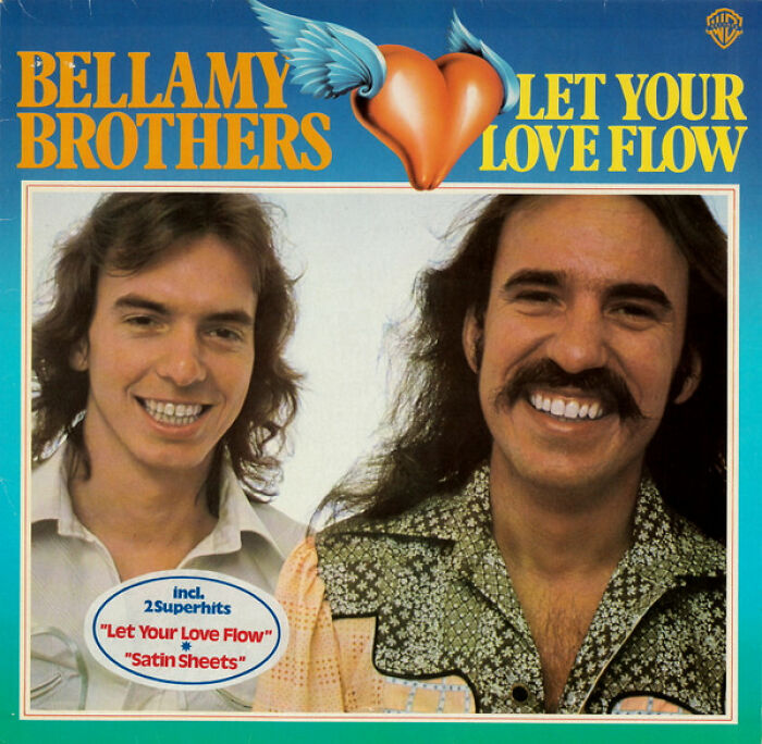 '70s album cover featuring two smiling men promoting hit songs "Let Your Love Flow" and "Satin Sheets."