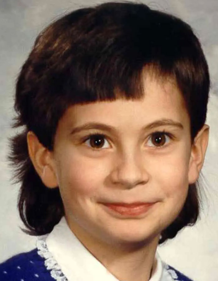 A young girl with short dark hair and a blue sweater, related to the Cherrie Mahan case from 1985.