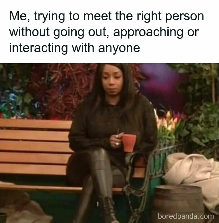 Introvert meme showing a person sitting on a bench holding a cup, captioned about meeting someone without interaction.