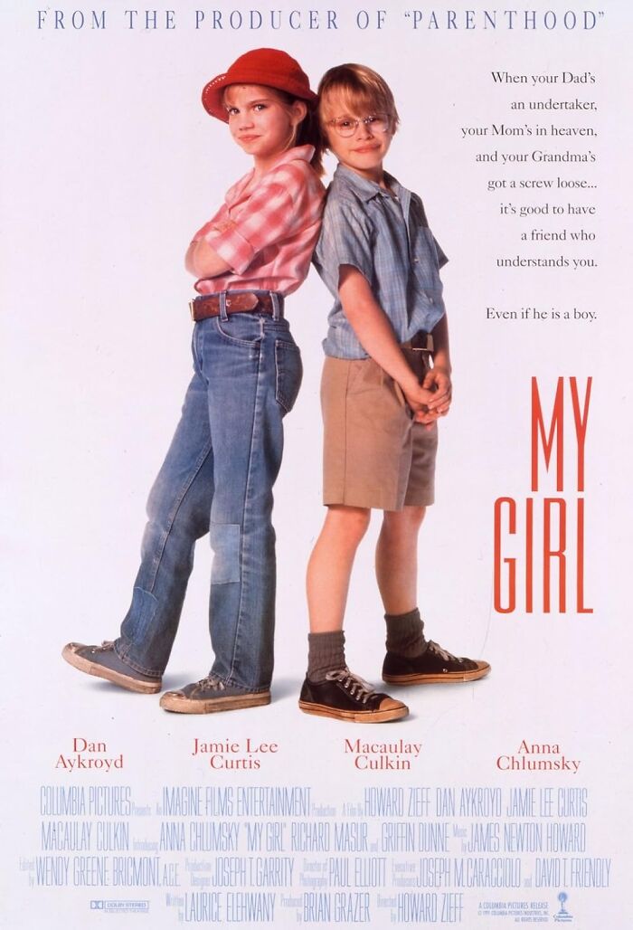 Movie poster for "My Girl," featuring two young characters standing back-to-back, embodying a tear-jerking film.