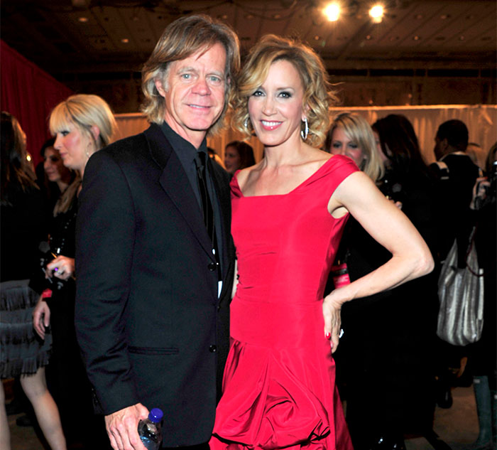 Man in a suit and woman in a red dress at a formal event, representing celebrity secrets and scandals theme.