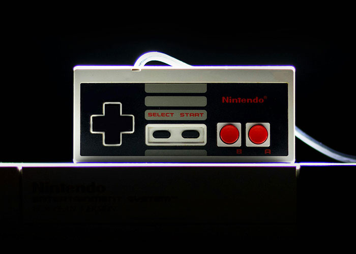 Retro Nintendo controller on a black background, symbolizing "cheat codes" for life.