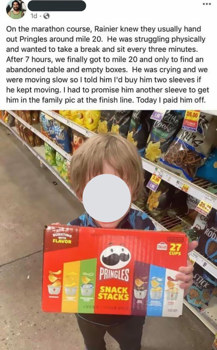 Child holding Pringles Snack Stacks box, smiling in a grocery store.