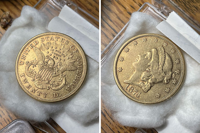 Two vintage American coins from 1874, displayed in protective cases, valuable for numismatists.