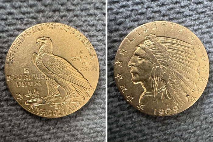 1909 US gold coin featuring an eagle and a Native American head, a numismatist's treasure.