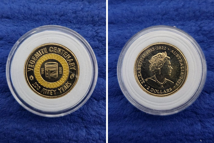 Coins from Australia, commemorating Yosemite Centenary and featuring Queen Elizabeth II, perfect for numismatists.