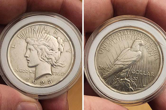 1923 Liberty coin front and back, showcasing vintage numismatist treasures.