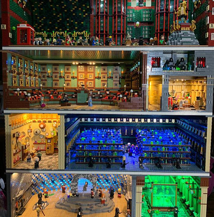 Detailed LEGO model showcasing various themed rooms with vivid lights and mini-figures, highlighting cool LEGO builds.