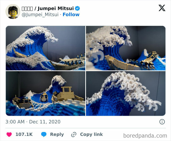 LEGO build of a large ocean wave with boats, showcasing intricate details and craftsmanship.