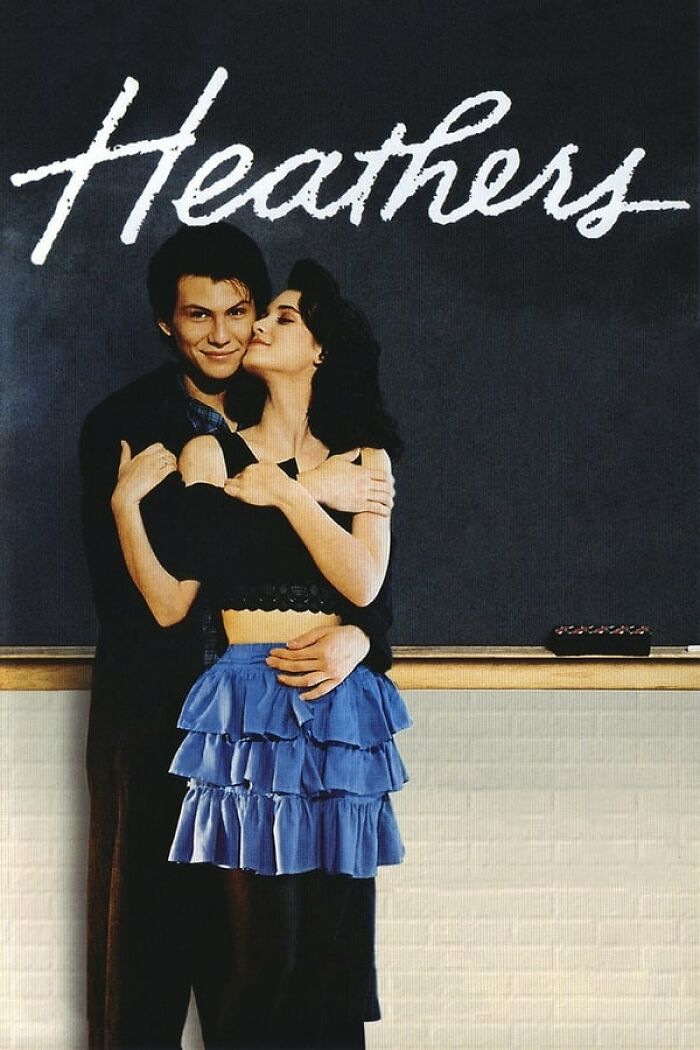 Cover of "Heathers" movie featuring a couple, highlighting best nostalgia movies theme.