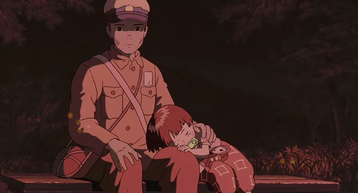 Two characters sitting together at night, depicting a sad and depressing movie ending.